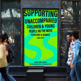 Refugee Youth Service poster promotion in the street