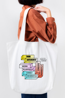 Camilla Gordon tote bag with stacked blocks and words: Think Differently, Work Playfully, Connect Meanfully and Create Honestly